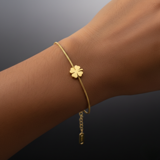 The Lucky Minimalist: Gold Snake Chain Bracelet with Sliding Four-Leaf Clover